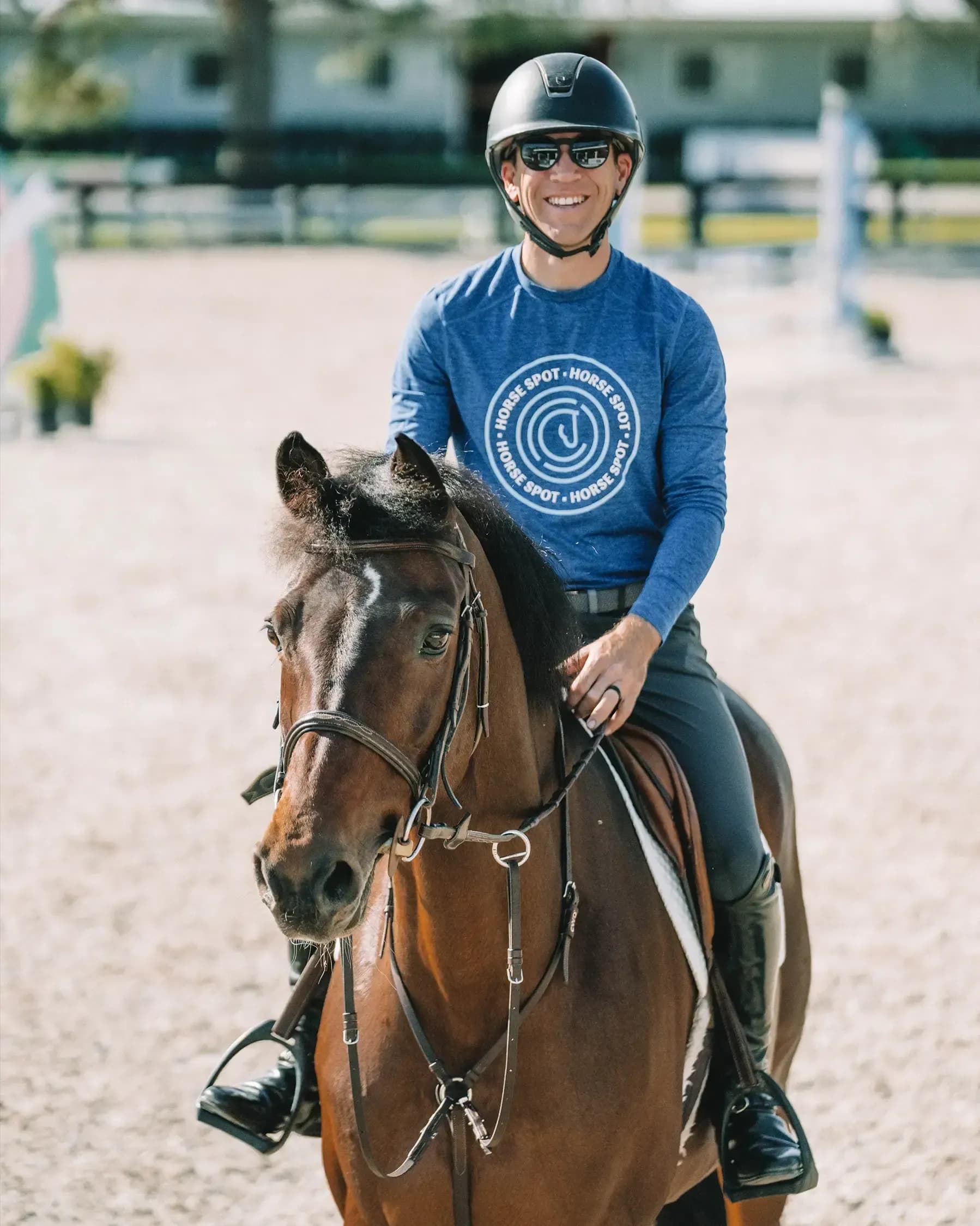 Horse running in an arena