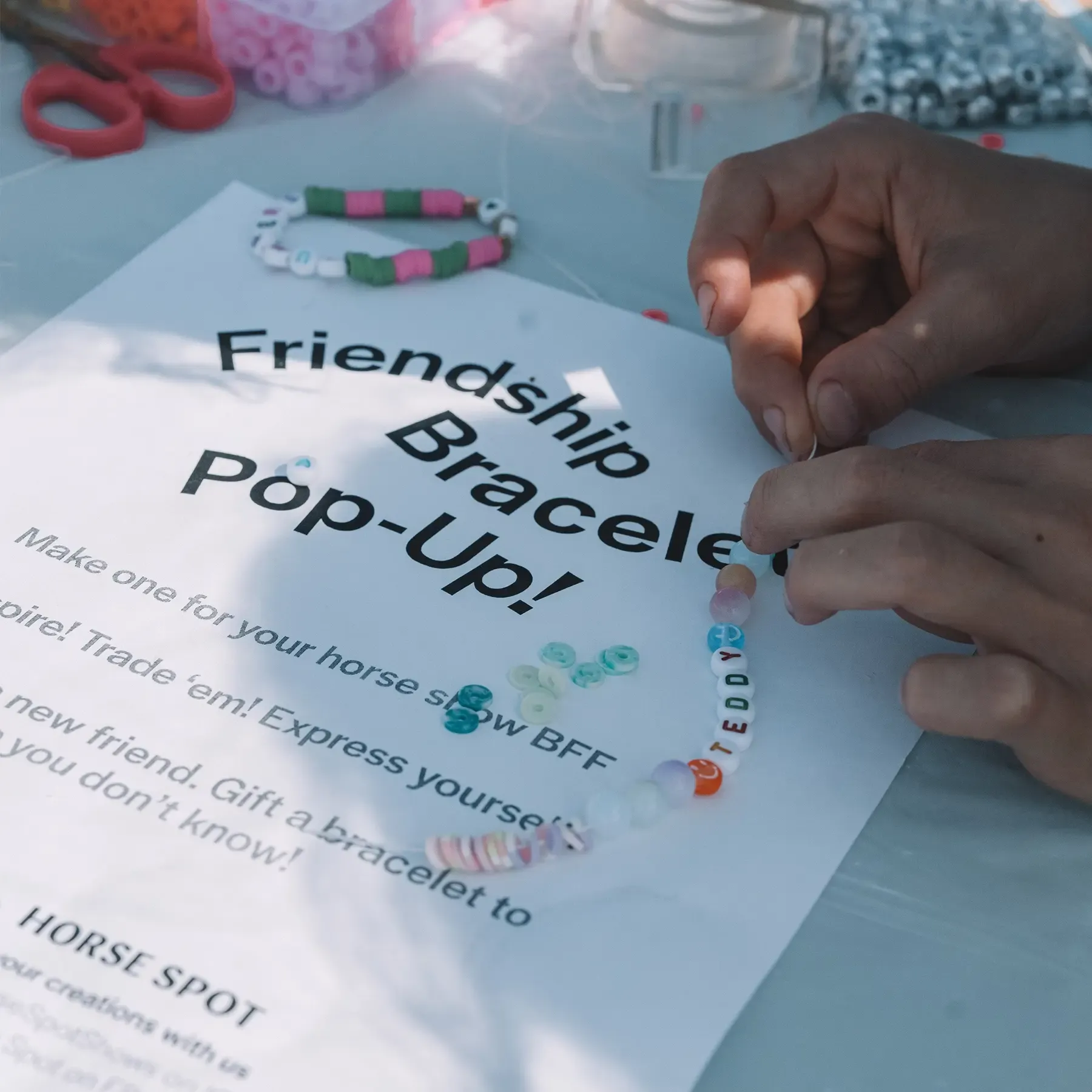 Burgundy card with Cortica branding