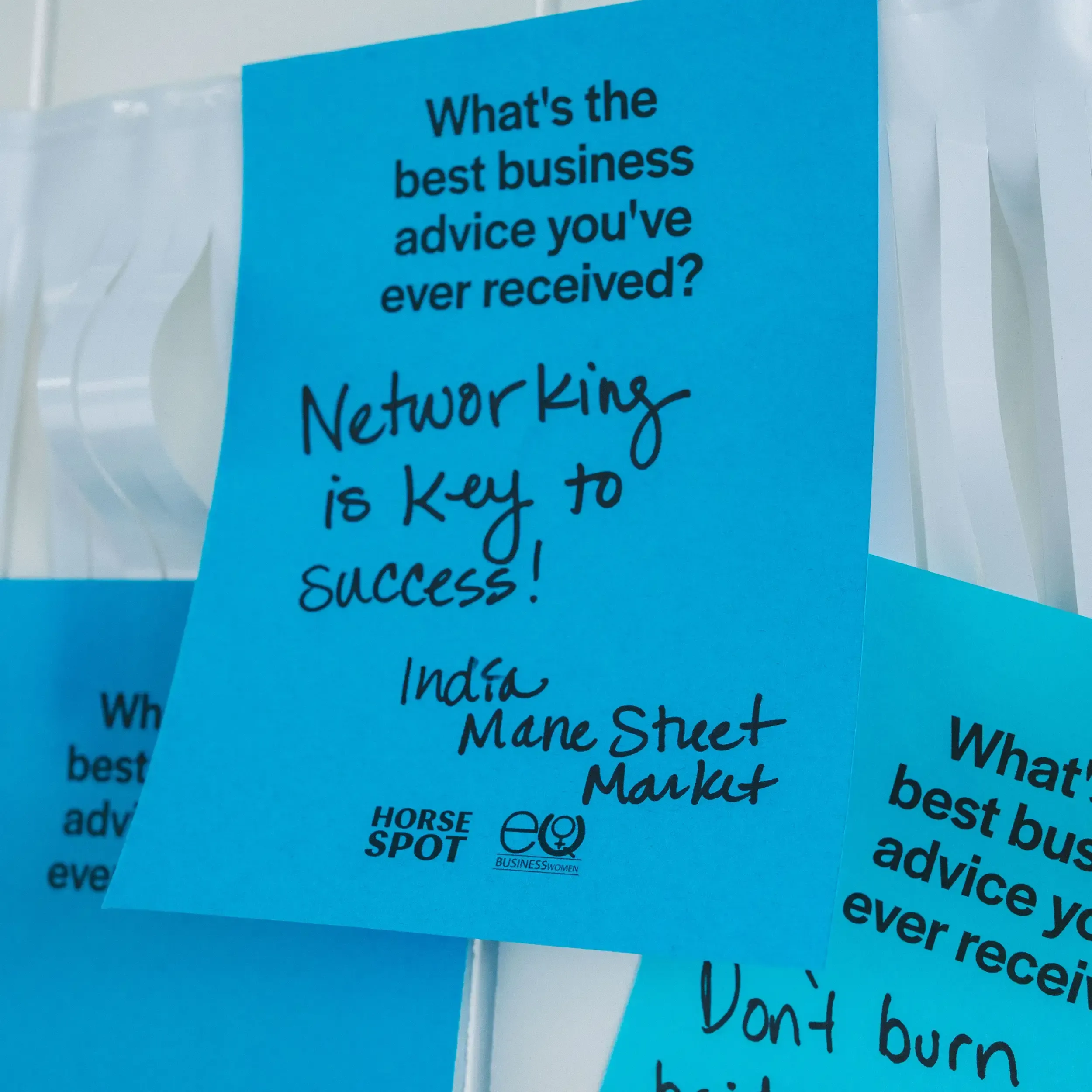 Burgundy card with Cortica branding